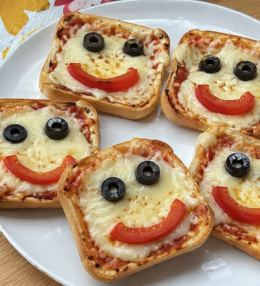 Mini Pizzas de Pan con Carita para el Día del Niño
